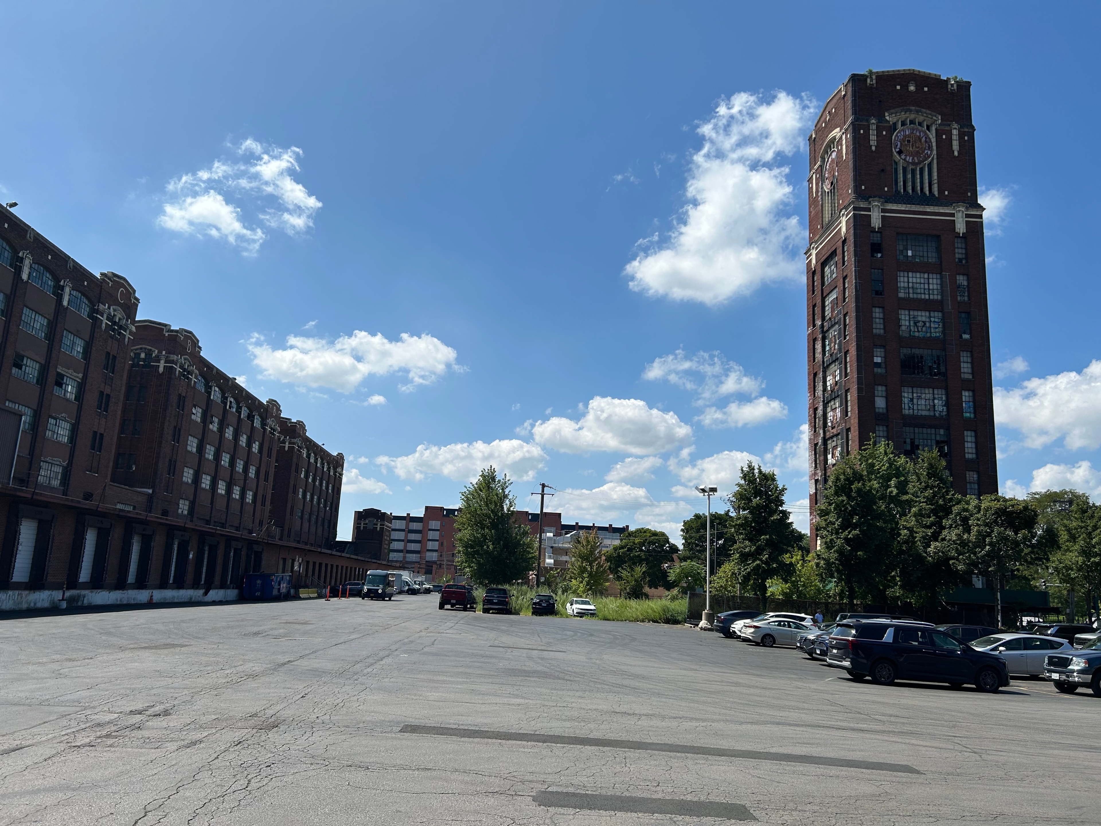 Clock Tower Industrial Park — The full complex from the grounds, showing the scale of this mammoth group of buildings. Formally known as the Central Manufacturing Union Freight Station, the complex has served as the Army Consolidation Station during WWII, the home of catalog giant Spiegel, and the filming location for Chicago Fire, Divergent, and Hoffa.